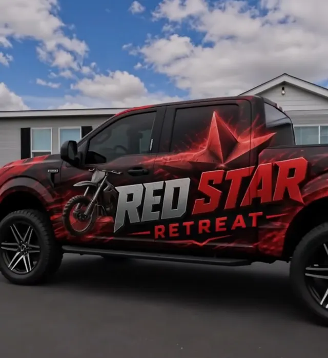 AI concept art of a pickup in a black and red Red Star Retreat wrap with a dirt bike graphic