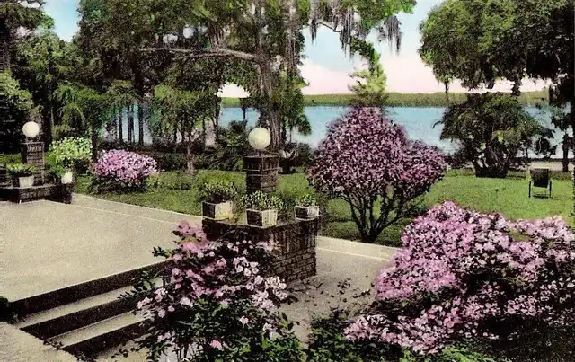 Vintage postcard view across Lake Maitland from a lakeside veranda, about 1922